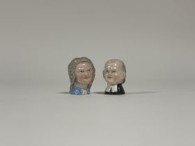 Two Meissen porcelain figural bottle stoppers, late 19th century, one modelled as a clergyman, the