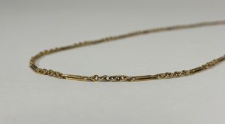 An 18ct gold chainlink necklace, of twin rectangular bars spaced by leaf-cast fancy links,