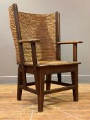 A small oak-framed Orkney chair in the manner of David Kirkness, circa 1920-30, the woven back above