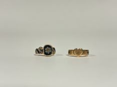 A 19th century diamond-set 18ct gold and enamel mourning ring, set to the centre with a small old-