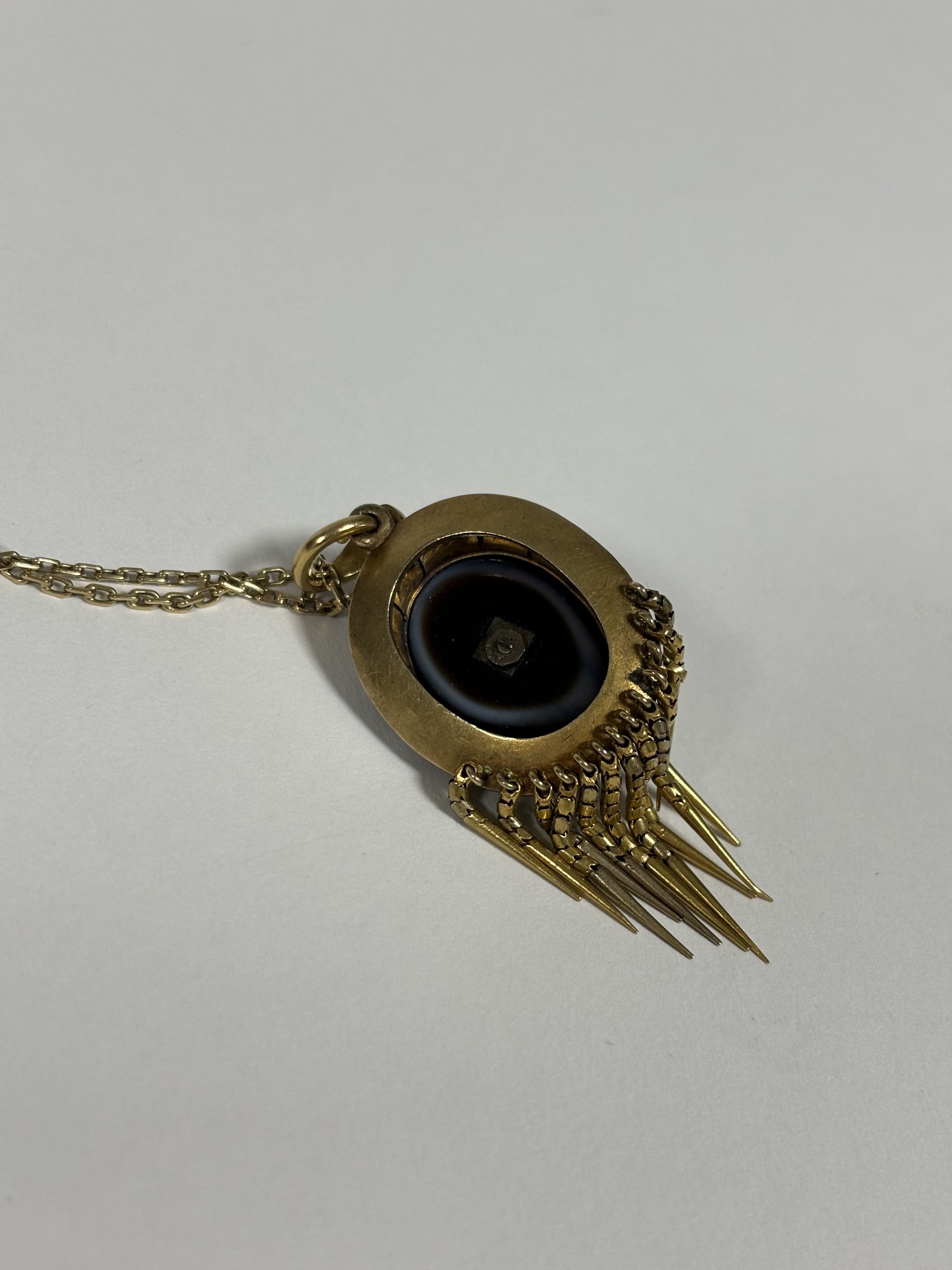 A 19th century yellow metal, banded agate and seed pearl locket pendant, the central cabochon banded - Image 4 of 4