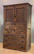 A 19th century Scottish scumbled pine press or housekeeper's cupboard, the twin panelled doors