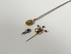 A group of late 19th/early 20th century yellow metal jewellery comprising: an oval locket, the