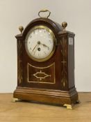 An 18th century and later mantel clock, the domed case with brass finials, handle, string inlay