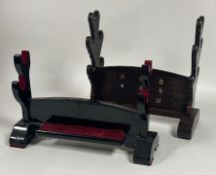 A mid 20thc. samurai sword rack, brown lacquered finish with mother of pearl inlay, suitable for