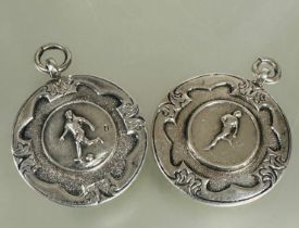 A pair of Birmingham silver foot ball medals, one for V Watson Pickett cup winner 1948-49 D x 3cm