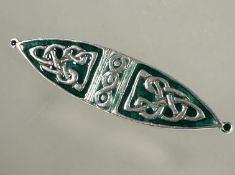 A Iain MacCormack 1950's Iona silver navette shaped celtic knot brooch with emerald green enameled