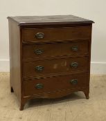 A 19th century mahogany chest fitted with four long drawers above a shaped apron and splayed bracket