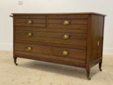 A late Victorian walnut chest, with towel rail to one end, raised on turned supports and castors.