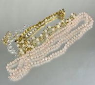 A long pink paste pearl necklace L 70cm , a pair of gilt metal bracelets, paste pearl and crystal