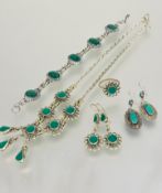 A malachite suite of jewelry to include a white metal rope pattern necklace with five panels and