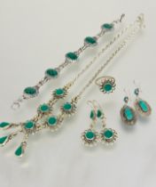 A malachite suite of jewelry to include a white metal rope pattern necklace with five panels and