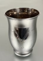 A continental white metal tulip shaped beaker with allover textured finish and Deco style V shaped