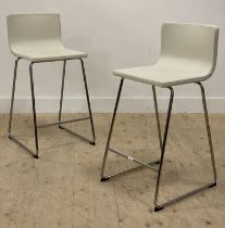 A pair of contemporary Ikea chrome and white faux leather bar stools. H91cm.