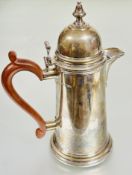 A Mappin & Webb Georgian style Sheffield silver coffee pot with domed hinged cover of tapered