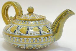 An Italian Cantagalli lustre glazed earthenware majolica teapot with medieval style motifs and