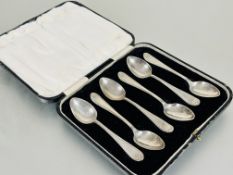 A cased set of six Sheffield silver tea spoons with fluted bordered and leaf terminals L x 11cm