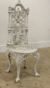 A Coalbrookdale style heavy cast iron garden chair, first half of the 20th century, the back