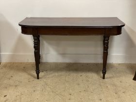 An early 19th century mahogany console table, the shaped top on turned supports (converted) H75cm,