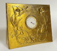 A Jugendstil H.A.C brass repousse decorated clock (h- 19cm, w- 22cm)