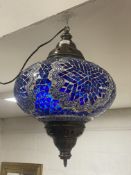 A Moroccan style pendent light fitting. H50cm.