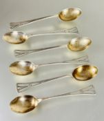 A set of six Birmingham silver coffee spoons with Deco style pierced fan shape terminals show