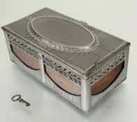 A Edwardian pewter mounted oak box, the top with oval panel enclosed within a laurel leaf border