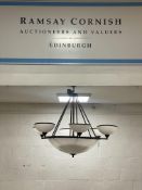 A large ceiling dish light, the central Perspex shade enclosing six bulb holders, and issuing