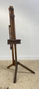 A large early to mid 20th century beech framed artists easel, inset with makers badge inscribed
