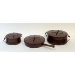 A trio Dansk brown enamelled pans, one saucepan with a wooden handle (l-49cm w-31.5cm) and one quart