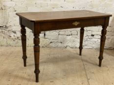 A late 19th century oak side table, the square top with canted corners and chamfered edge above a