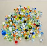 A collection of vintage coloured and plain marbles (A lot)