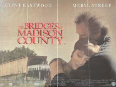 A framed 1995 movie poster of "Bridges of Maddison County", label verso. (75cmx100cm)