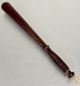 A Edwardian mahogany police truncheon with ring turned grip with signs of use  L x 40cm