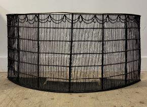 A 19th century brass and wire nursery fender decorated with swags. H52cm, W110cm.