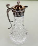 A Mappin & Webb Sheffield silver mounted Regency style cut crystal claret jug of baluster form