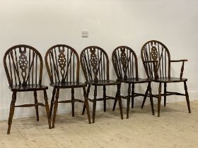 A set of five (4+1) stained beech Windsor type hoop, spindle and splat back dining chairs, with