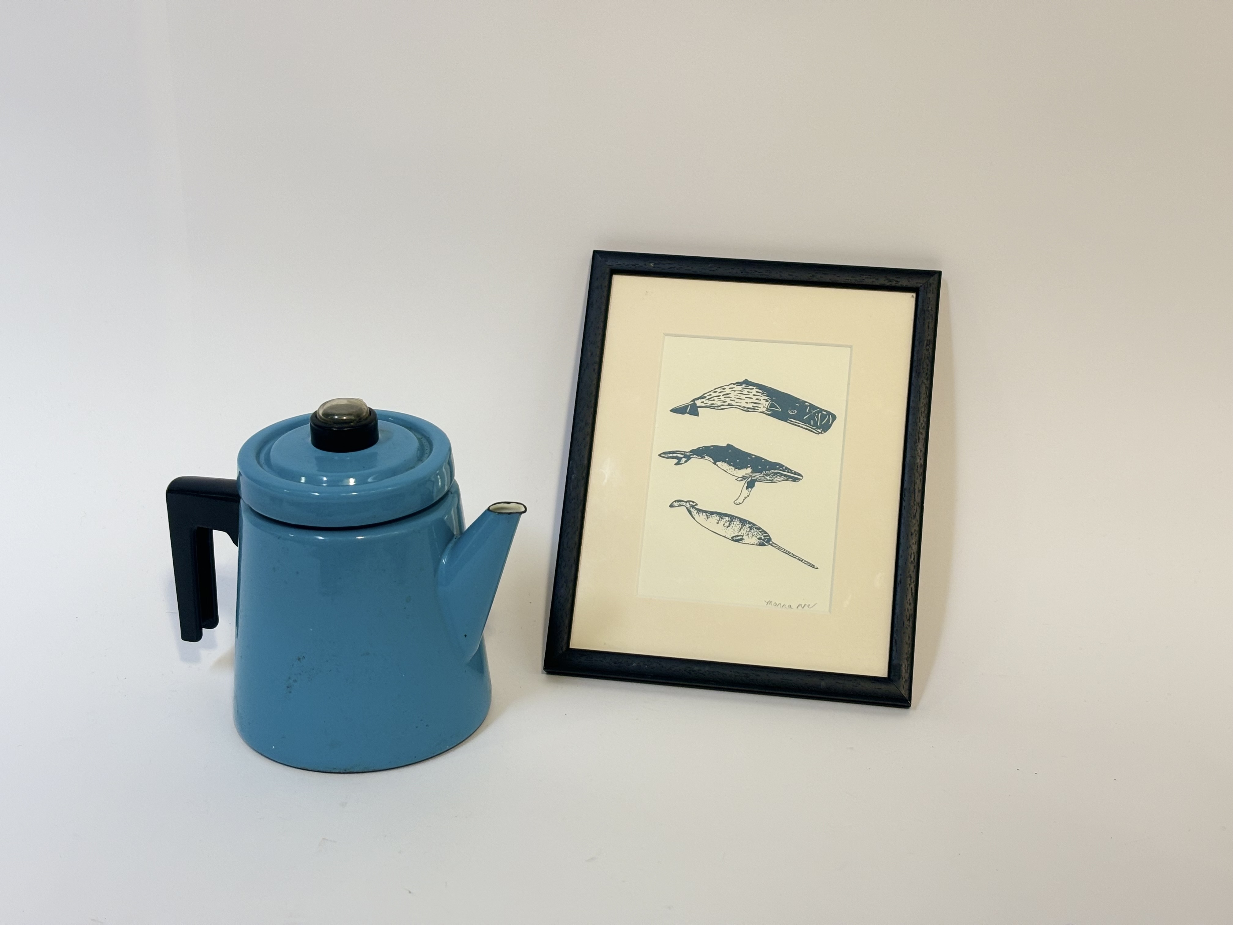 A 1960's Finel Pehtoori turquoise enamelled coffee pot (h-20cm) and a Manna Piper, lino-print of