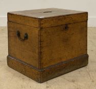 A Victorian oak chest, with hinged lid opening to a void interior, carry handle to each side and