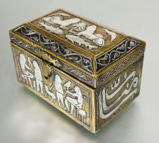 A Egyptian brass casket with olive wood lined interior the top mounted with white metal and brass