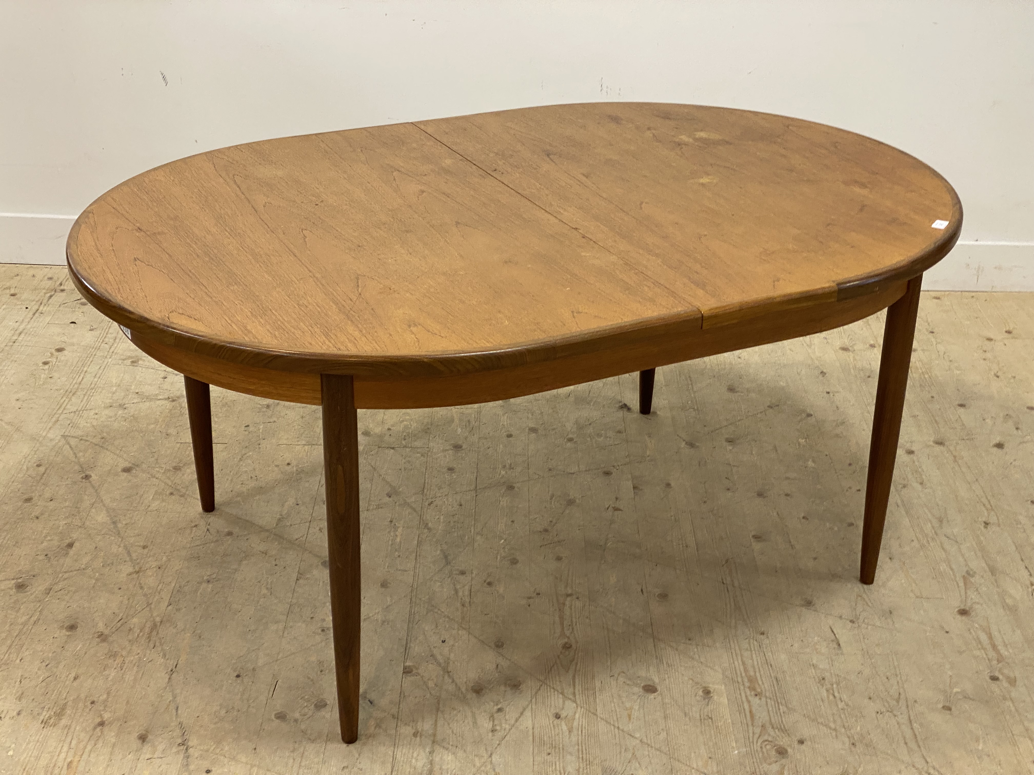 G-Plan, a mid century teak extending dining table, the oval top opening to an extra leaf, raised - Image 2 of 3