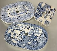 A 19th English oval china meat dish drainer decorated with transfer printed three men on a bridge