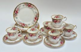 A Queen Anne Summer Rose pattern China part tea service comprising six tea cups, six saucers and six