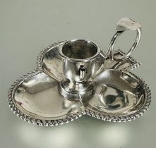 A Edwardian Birmingham silver three leaf clover chamber cadlestick holder with rope pattern border