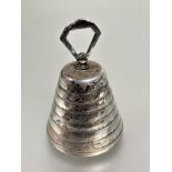 A Birmingham silver bee hive shaped ringed table bell complete with clapper H x 9cm D x 6.5cm