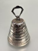 A Birmingham silver bee hive shaped ringed table bell complete with clapper H x 9cm D x 6.5cm
