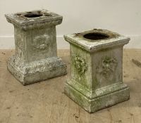 A matched pair of terracotta garden plinths, first half of the 19th century, each decorated with