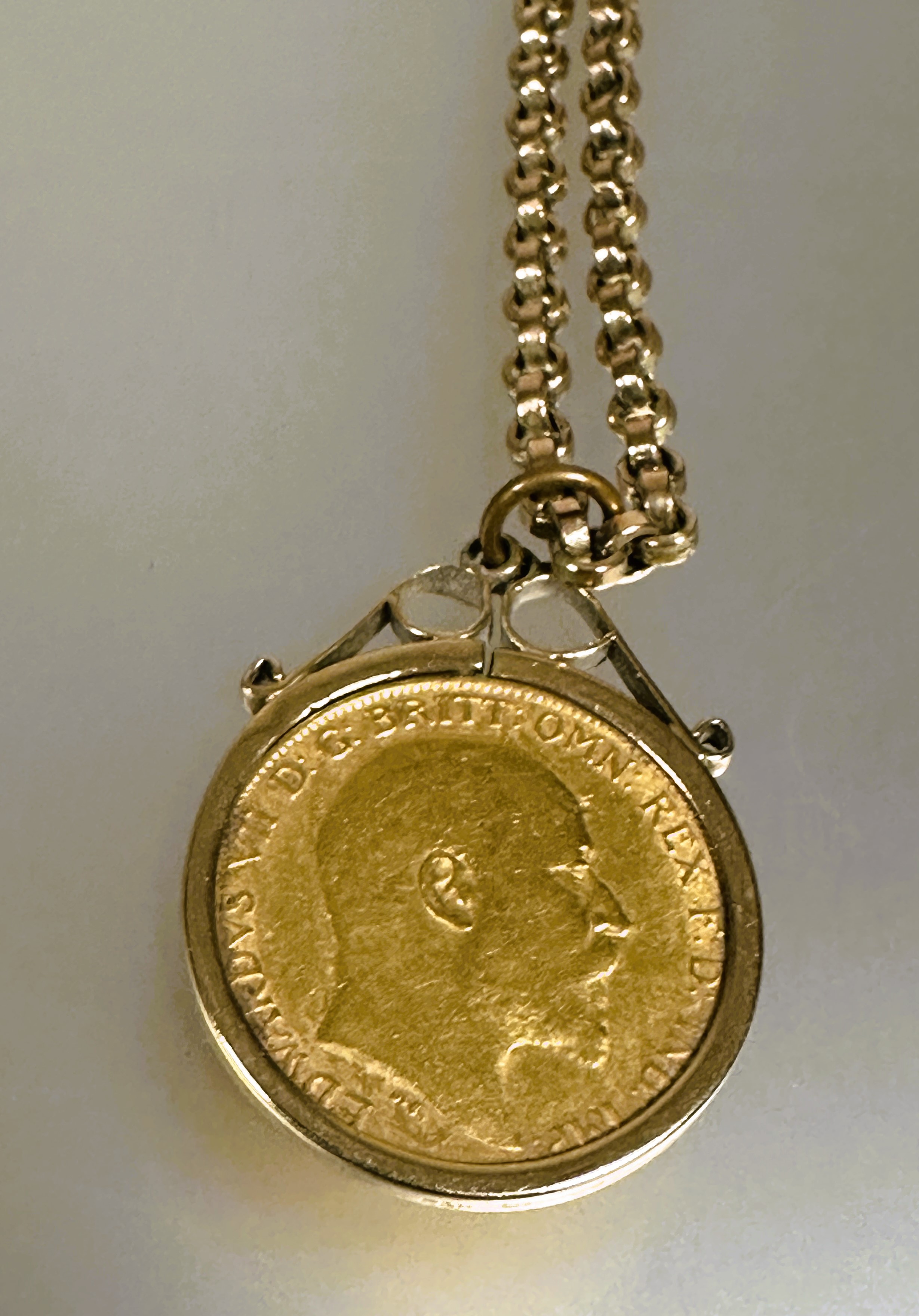 A Edward VII gold half sovereign 1902 in yellow metal frame on a 9ct gold belcher link chain - Image 2 of 3