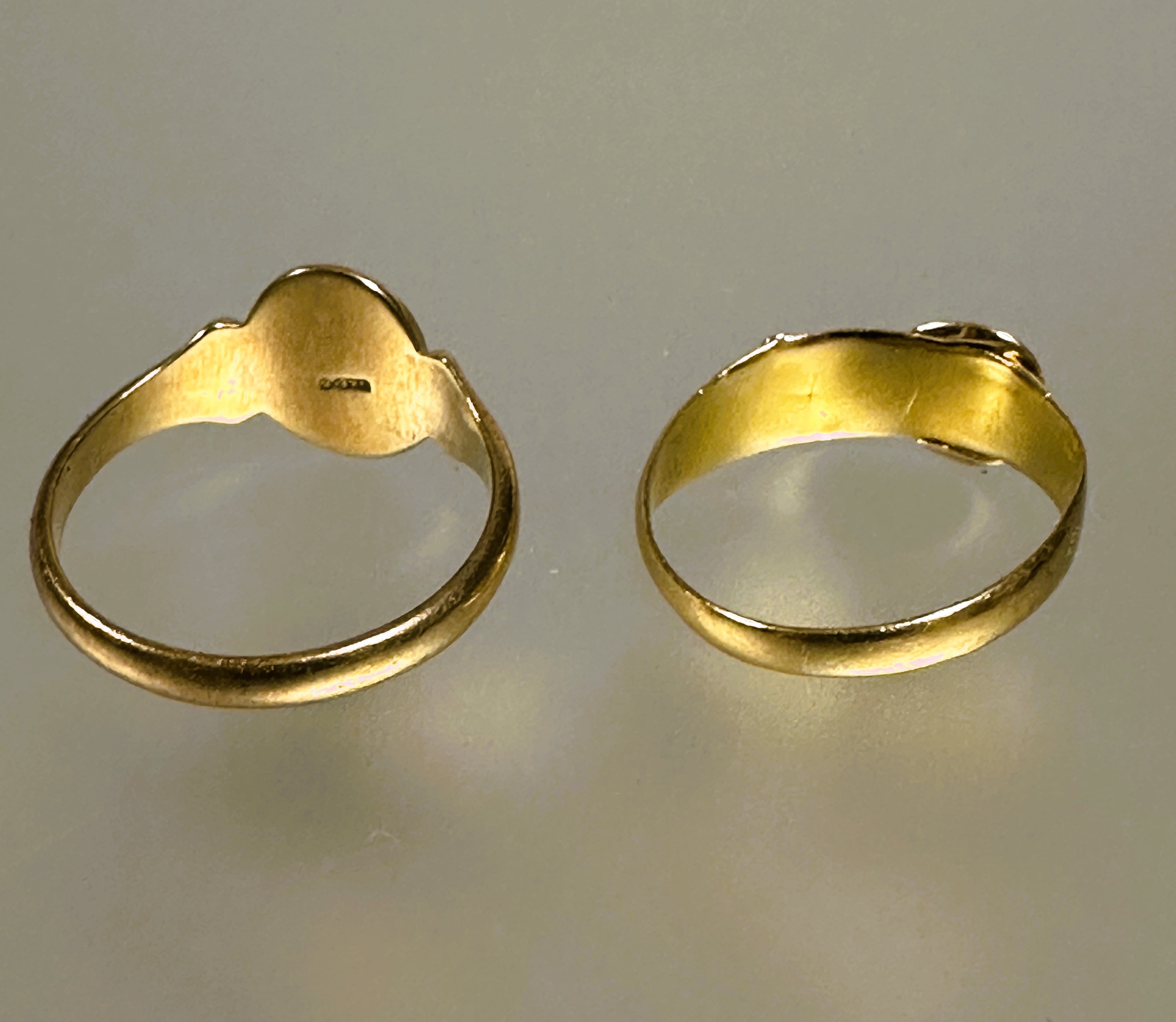 A 18ct gold buckle style ring set two clear stones L / M 1.4g and a 9ct gold oval signet ring with - Image 2 of 2