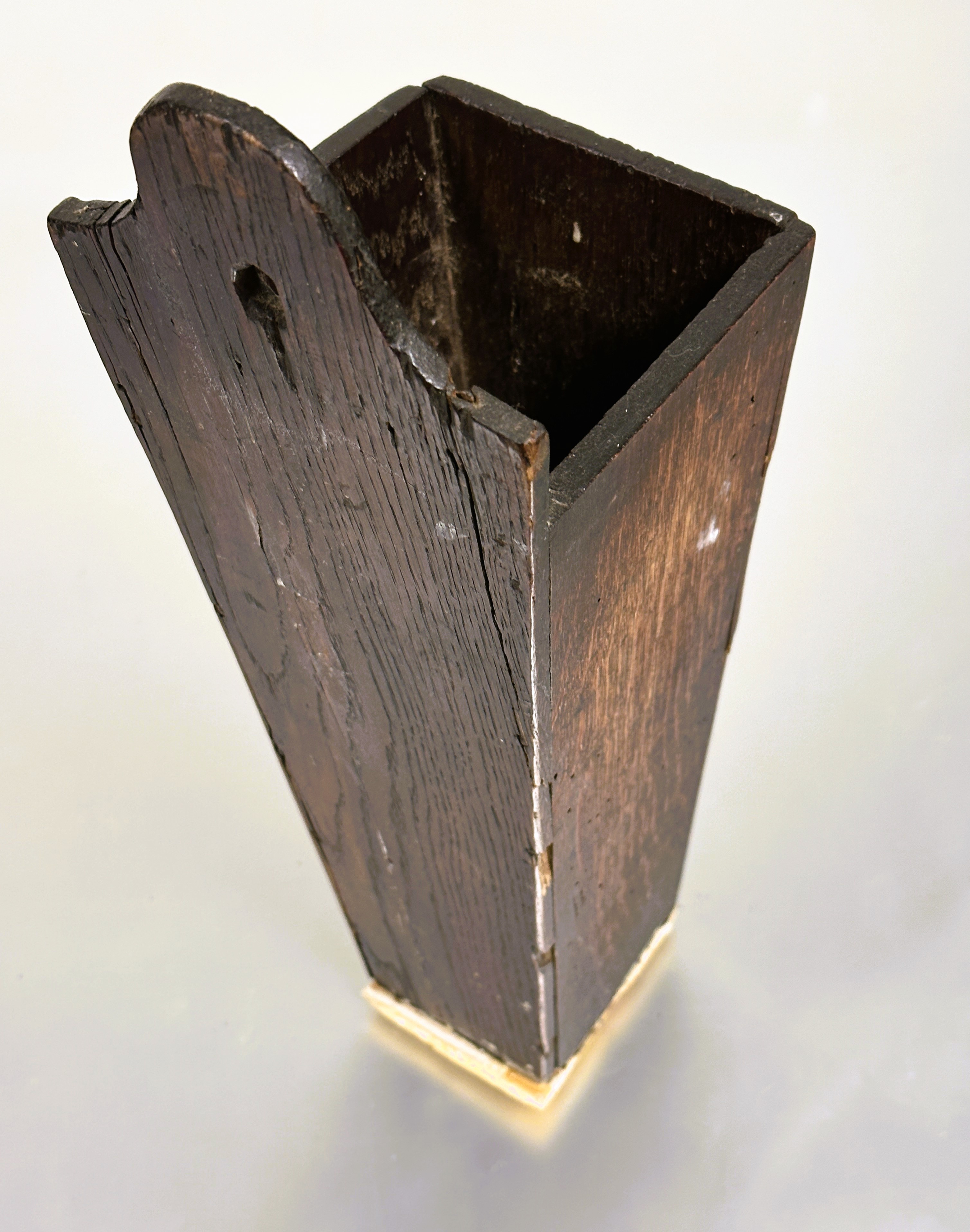 A 18thc oak candle box of tapered form with arched panel back with pierced hole and replaced base - Image 2 of 5